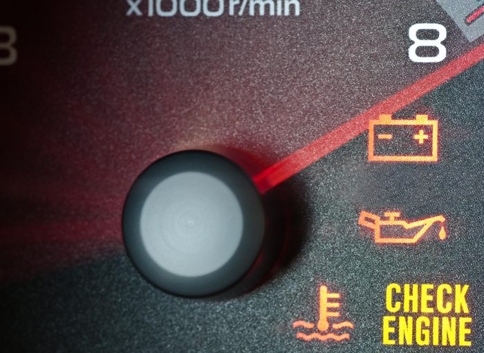 image showing warning lights on a dashboard