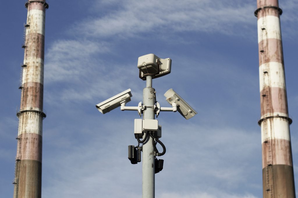 request cctv footage picture showing multiple cctv cameras on a pole in a city