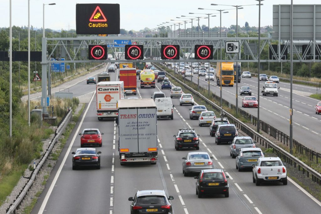 image showing busy smart motorway with speed limit at 40mph